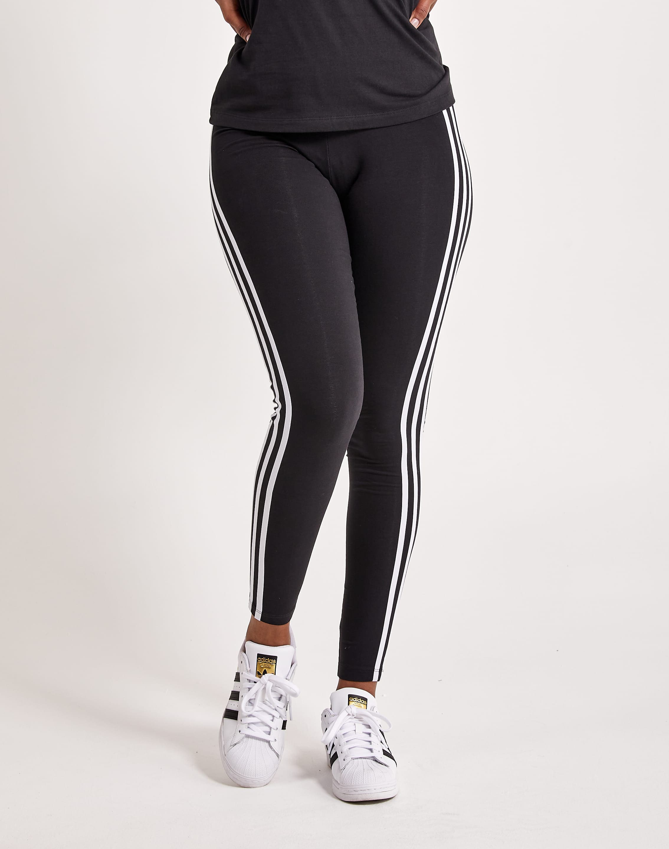 adidas Training Train Essentials 3 stripe leggings in black | ASOS